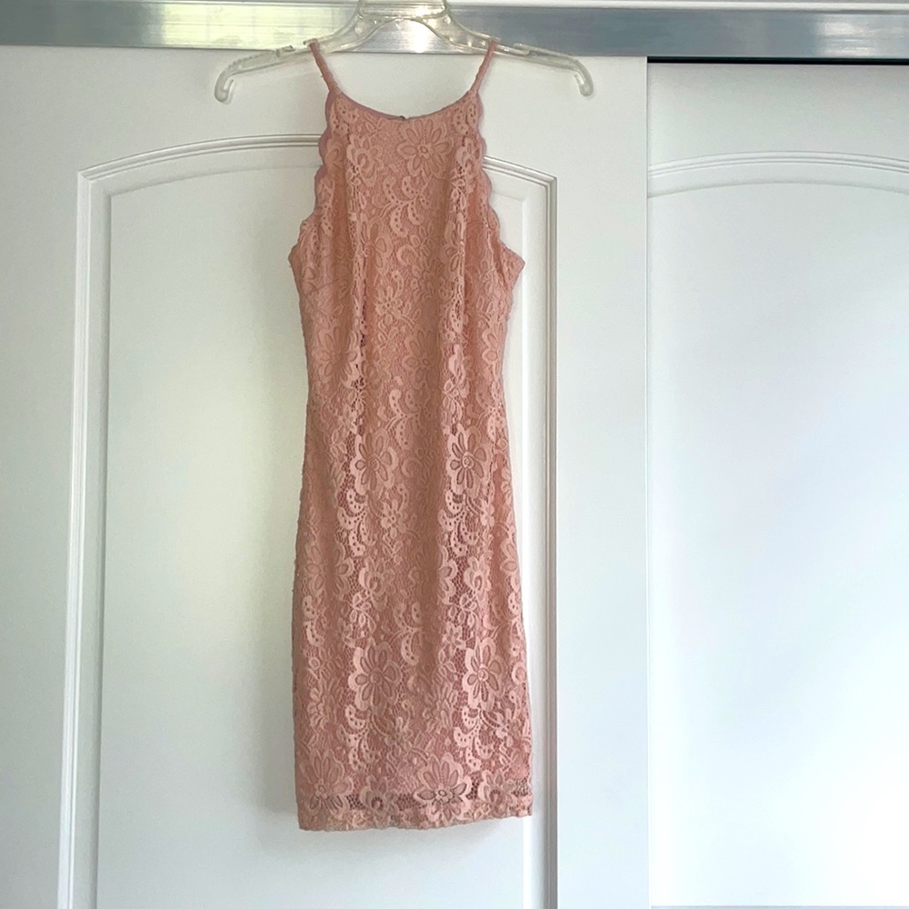 Hi this is a dress from BCX, it’s a creamy pink color size small.